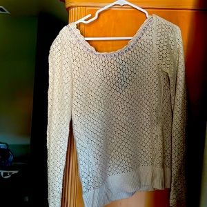 Light tan crocheted free people sweater with beaded details and slight open back
